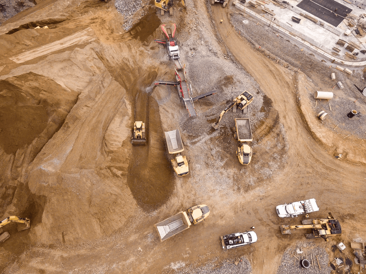 An image of a mining site with operations ongoing from the top view